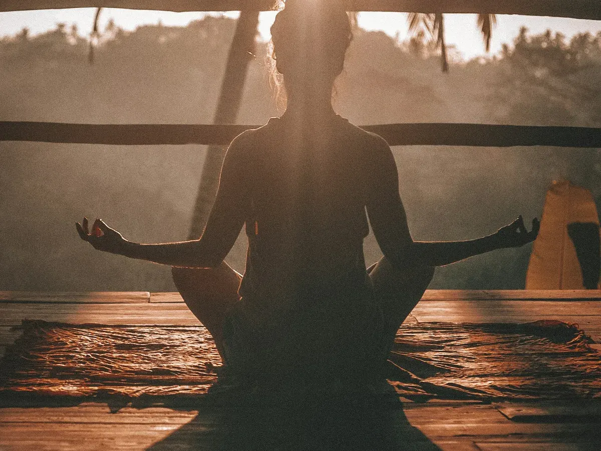 An outdoor meditation session in a natural setting
