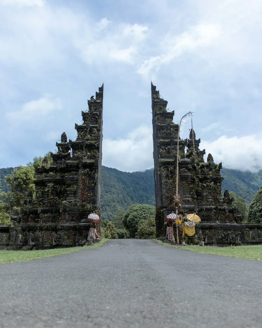 A traditional Balinese temple gate surrounded by greenery